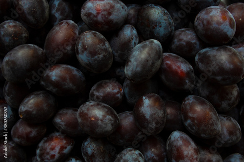 Heap of ripe plums close up