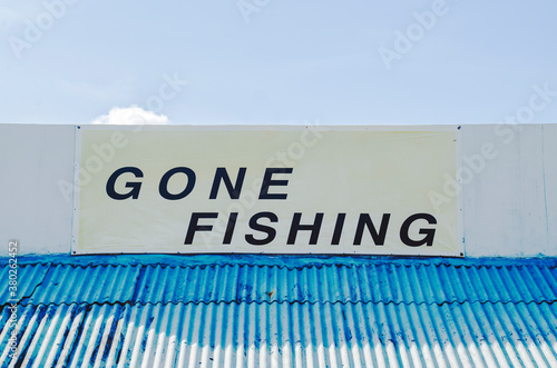 Big public sign/display message that reads gone fishing