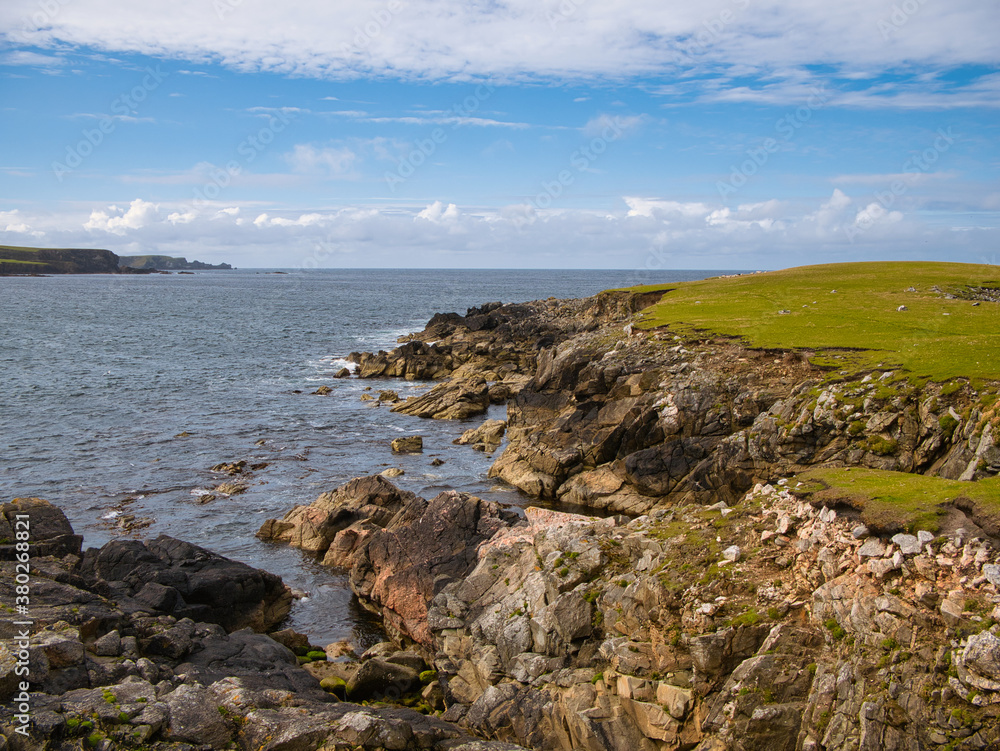 Dramatic coastal scenery around Inna Ness near Breckon on the island of Yell, Shetland, Scotland, UK - eroded, fragmented metamorphic bedrock Dramatic coastal scenery around Inna Ness near Breckon on the island of Yell, Shetland, Scotland, UK - eroded, fragmented metamorphic bedrock