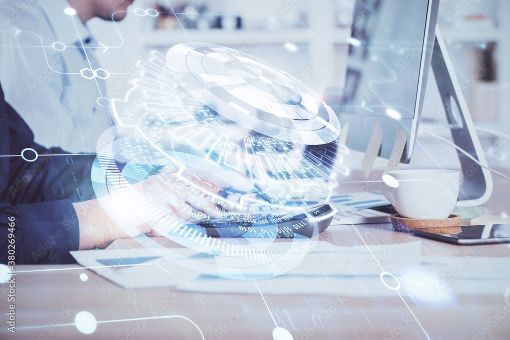 Double exposure of data internet theme hologram with man working on computer on background. Concept of innovation. Double exposure of data internet theme hologram with man working on computer on background. Concept of innovation.