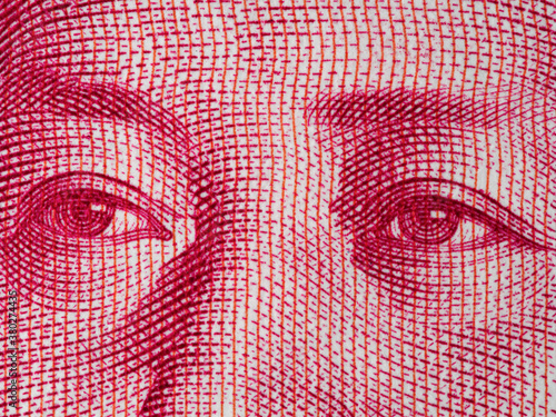 Mao Zedong eyes on chinese 100 yuan banknote macro, China money closeup photo