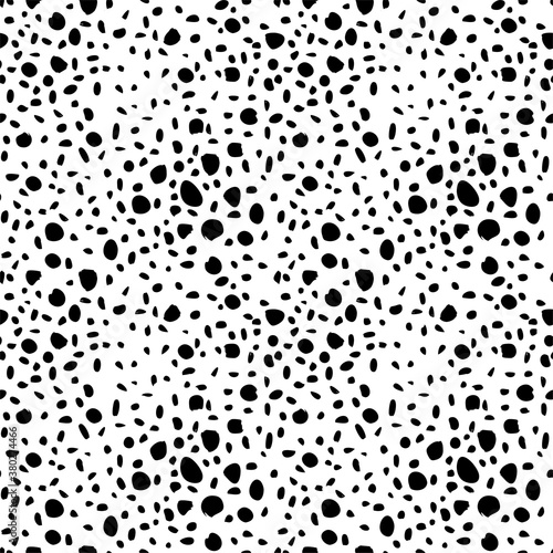 Seamless cheetah skin pattern. Endless hand drawn cheetah leopard texture for print  fabric  textile  wallpaper. Trendy jungle animal design. Artistic black and white cat fur illustration