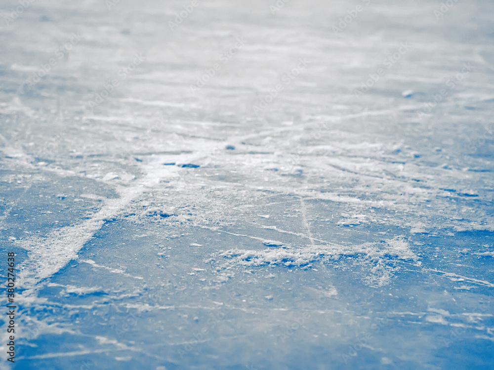 Ice hockey rink surface background, abstract blue ice, selective focus, shallow dof Ice hockey rink surface background, abstract blue ice, selective focus, shallow dof