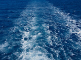 Cruise ship wake on the sea surface, ocean boat foam trail