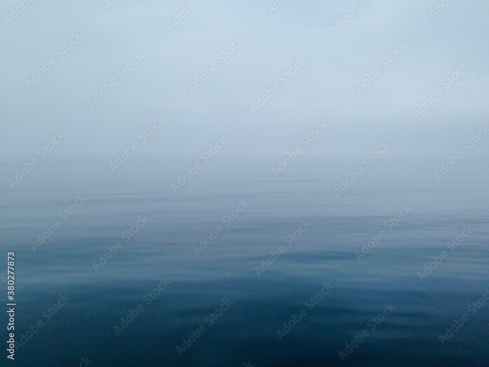 Fog over calm waters Fog over calm waters