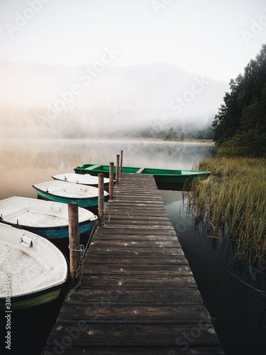 Wooden pier and boats on th...