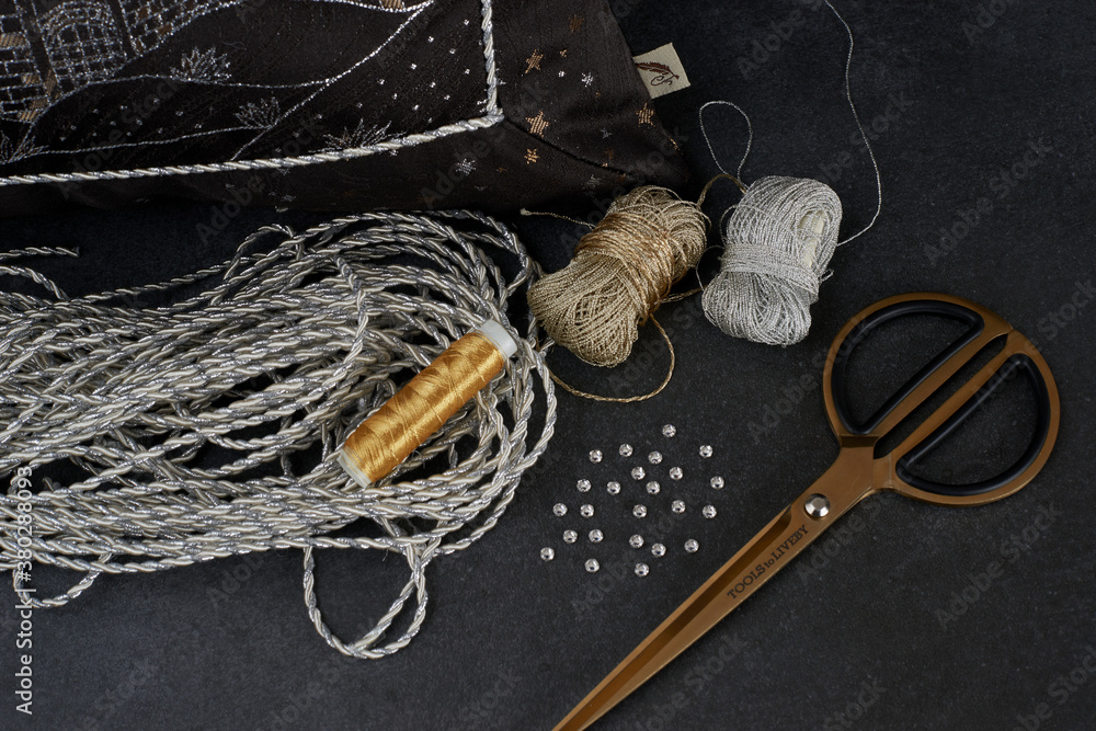 set for needlework threads, fabrics of different scissors