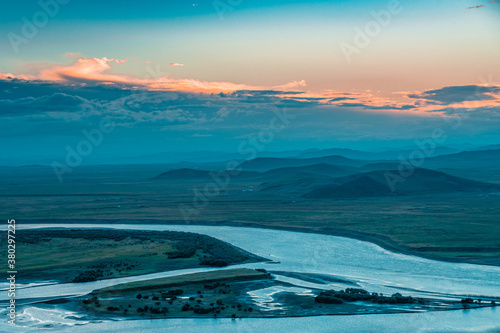 The sunset landscape of yellow river winding up in Ruoergai grassland, in Sichuan, China.