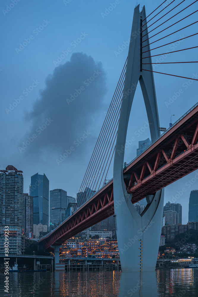 Fototapeta premium Night view of the Qiansimen bridge and the skyline in Chongqing, China.