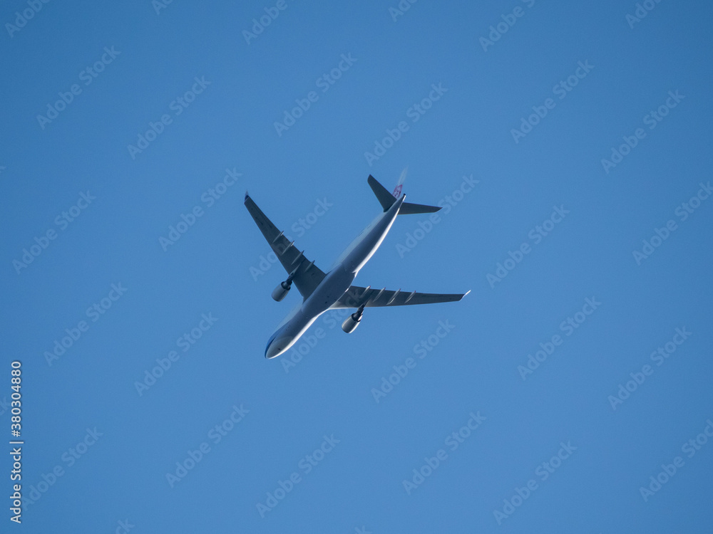 Aeroplane flying high above Sydney Harbour Australia Aeroplane flying high above Sydney Harbour Australia