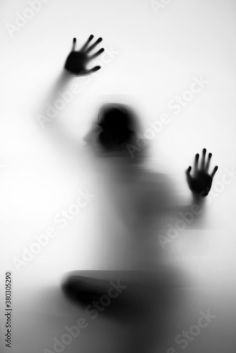 Wallpaper Mural Silhouette of a woman behind the glass Torontodigital.ca