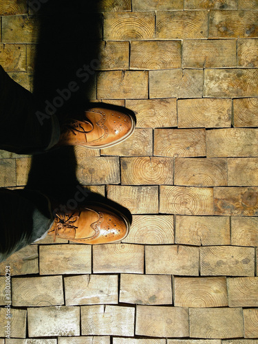 wingtips and wood floor