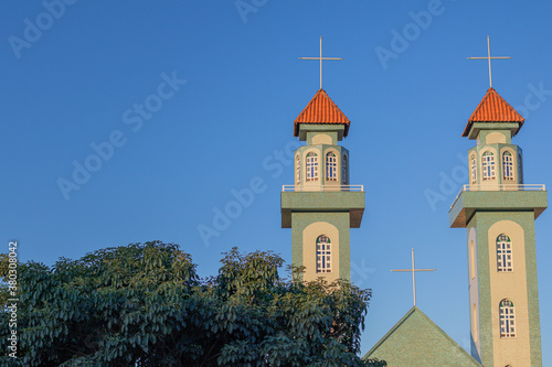 church in brazil with beautiful images of cross and faith catholic church with beautiful architecture and clear skies with trees and vegetation as a tourist spot church faith devotion