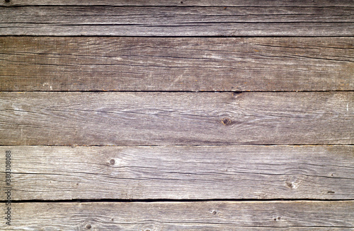 Brown color old grungy wooden planks background.