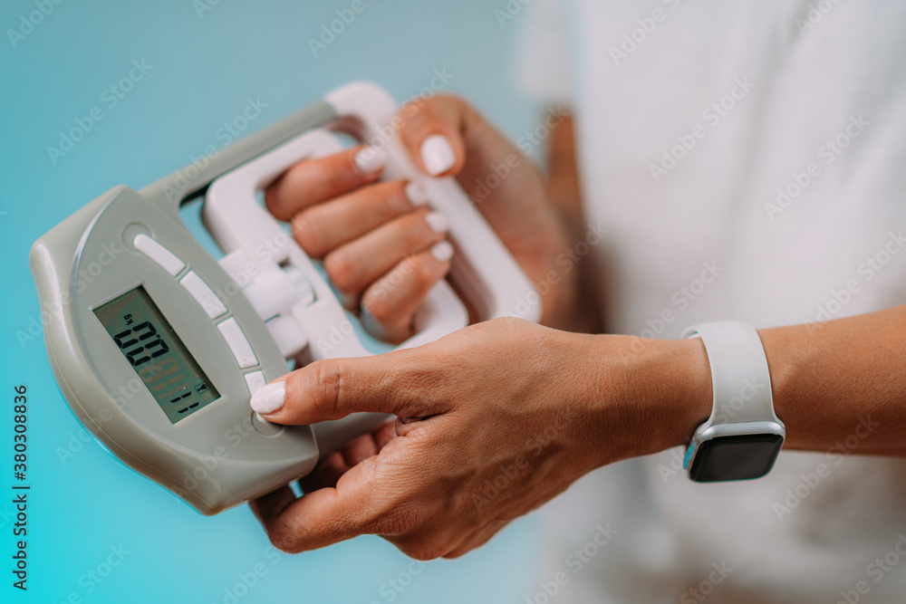 Using Hand Dynamometer for Grip Strength Test Stock Photo Adobe Stock