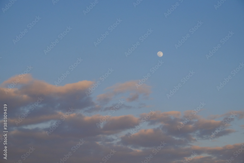Clouds in the evening sky. Twilight sky as background. Clouds in the evening sky. Twilight sky as background.