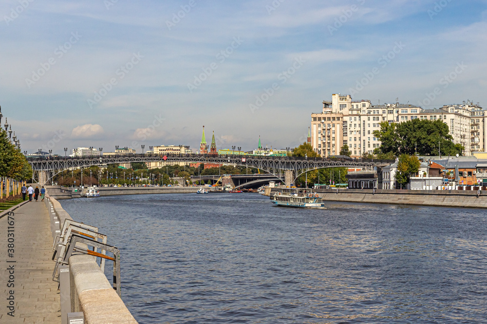 The Moscow river with the river boats, the Patriarshy bridge and the Kremlin