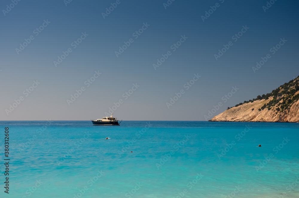 An yacht on the Ionian Sea, near Myrtos beach, in Kefalonia, Greece