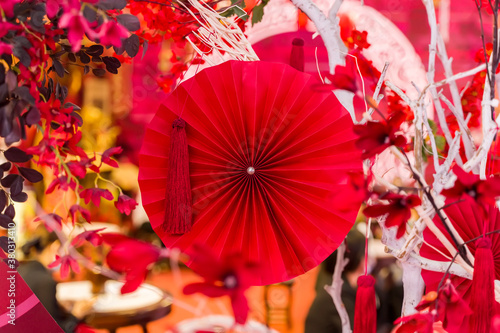 Chinese paper fans in pastel colors on wedding