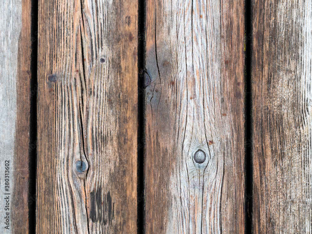 wet shabby wooden planks of outdoor paving of pier close up wet shabby wooden planks of outdoor paving of pier close up