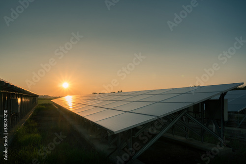 Power plant using renewable solar energy with sun green energy concept.