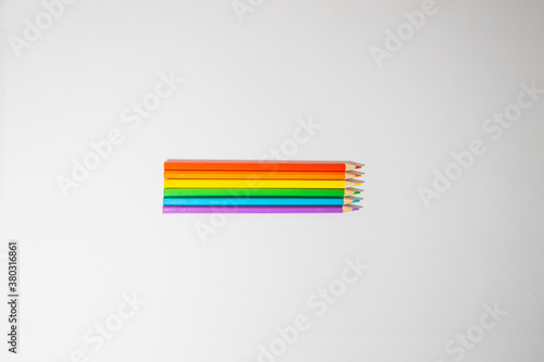 colored wooden pencils, forming colors of the LGBTI flag