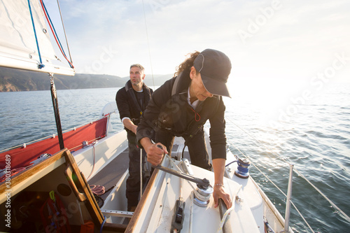 Couple sailing together.