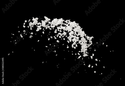 Salt splash explosion  isolated on black background , freeze stop motion