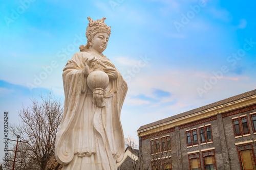 Mazu is a Chinese sea goddess,  adjacent to Tianhou Temple at Guwenhua Jie street in Tianjin, China photo