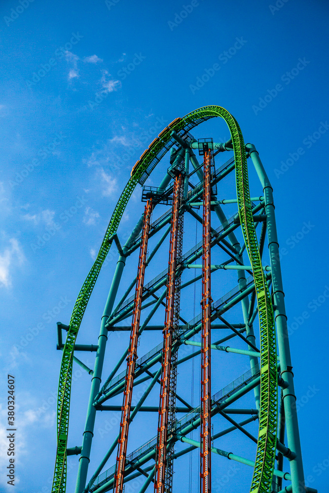 Roller coaster against a deep blue sky Roller coaster against a deep blue sky