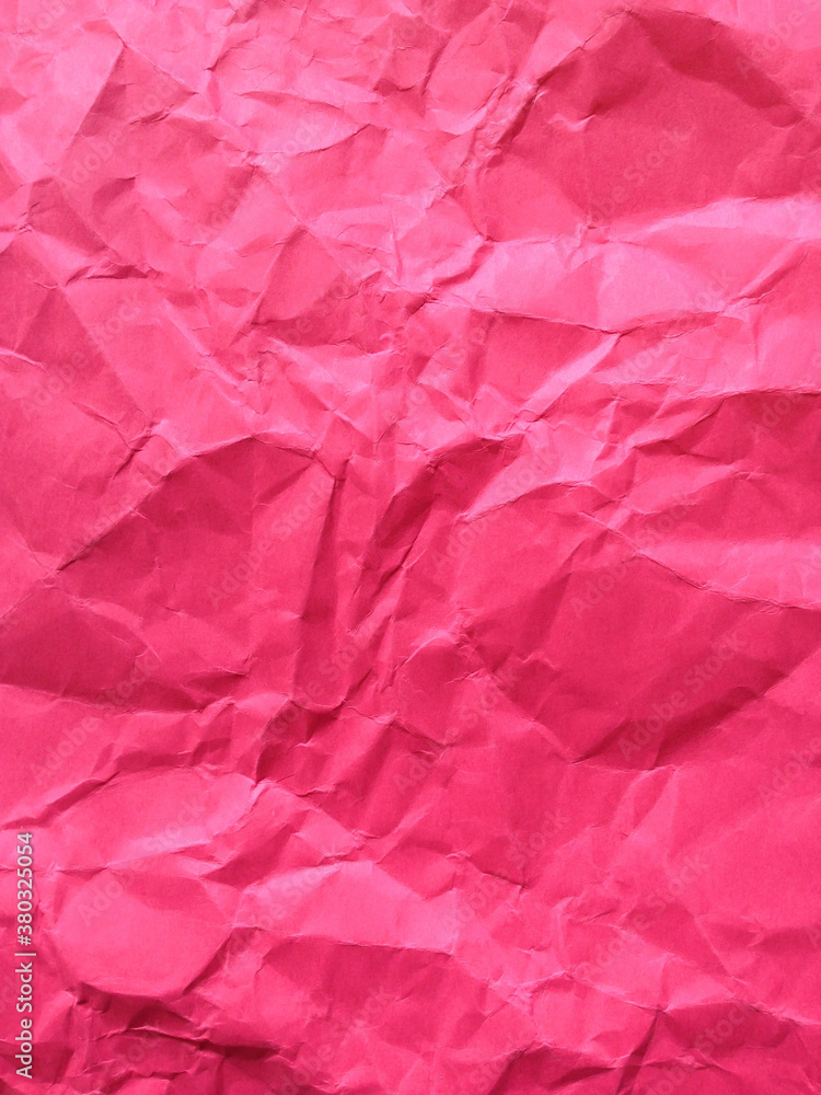 Close up of crumpled piece of colorful construction paper Close up of crumpled piece of colorful construction paper
