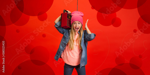 Happy listening to music. Caucasian teens girl portrait. Beautiful female model in casual. Concept of human emotions  facial expression  sales  ad  copyspace. Bright  modern illustrated background.