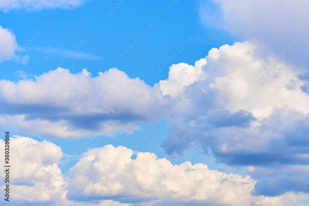 Obraz premium Sunny summer sky with clouds close up