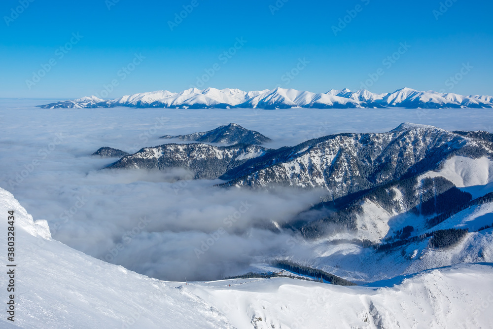 Winter Mountains and Light Fog in the Valley