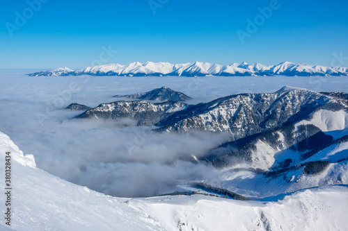 Winter Mountains and Light Fog in the Valley