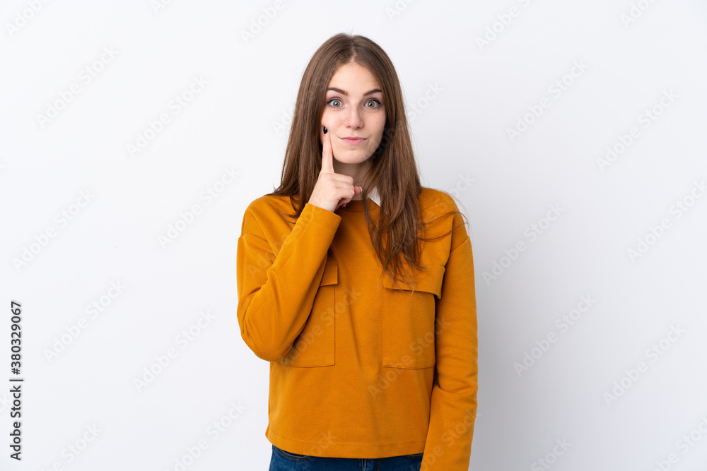 Young woman over isolated white background Looking front Young woman over isolated white background Looking front