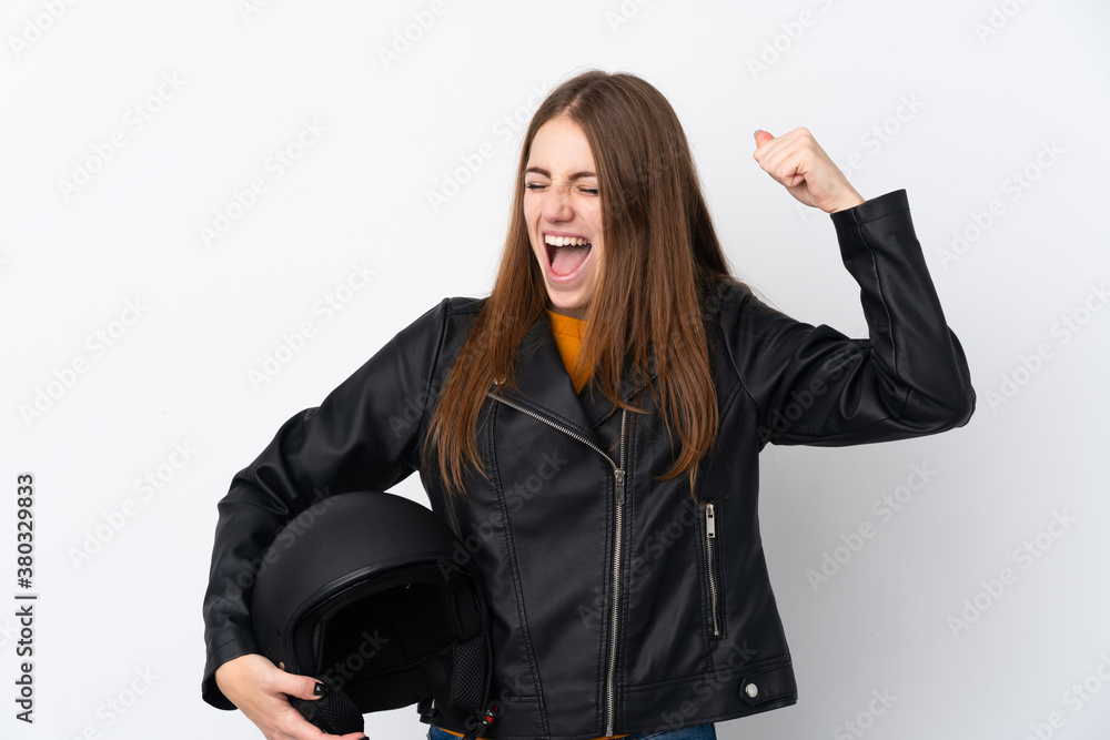 Woman with a motorcycle helmet celebrating a victory Woman with a motorcycle helmet celebrating a victory
