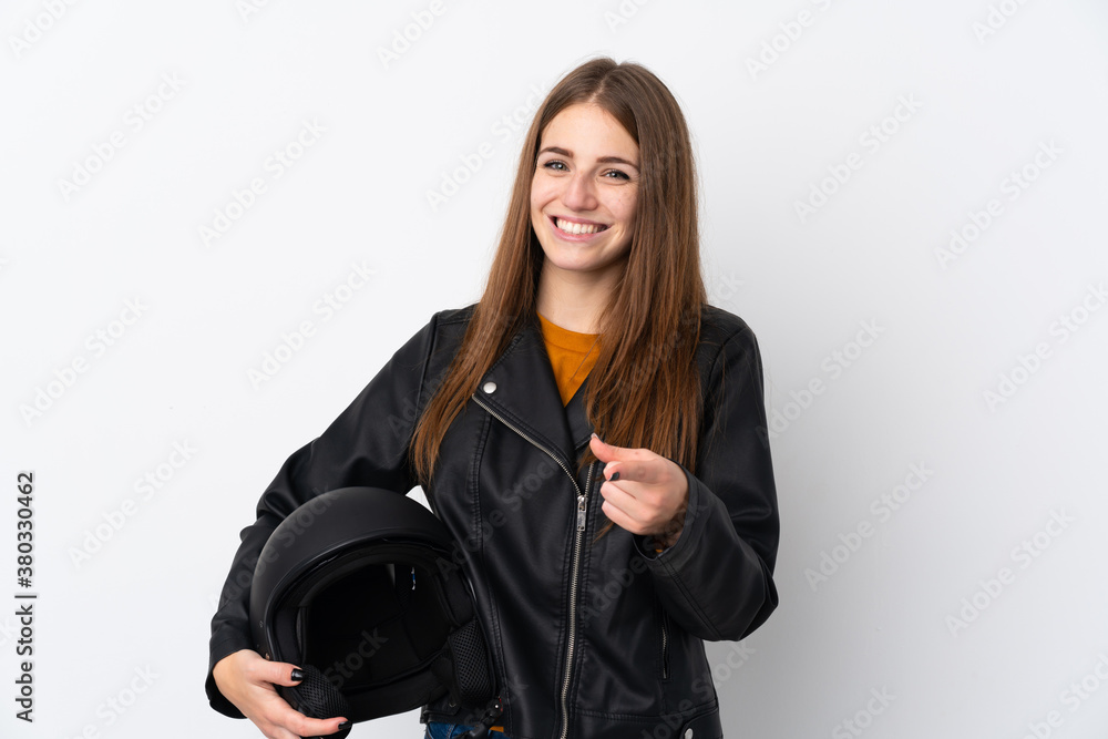Woman with a motorcycle helmet points finger at you Woman with a motorcycle helmet points finger at you