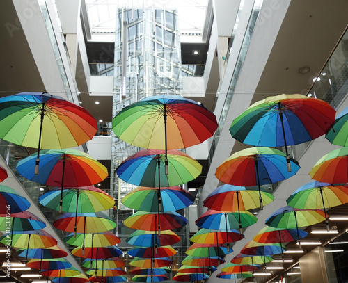Wallpaper Mural Rainbow umbrella on the background of the supermarket. Many multi-colored umbrellas. umbrella decoration in store Torontodigital.ca
