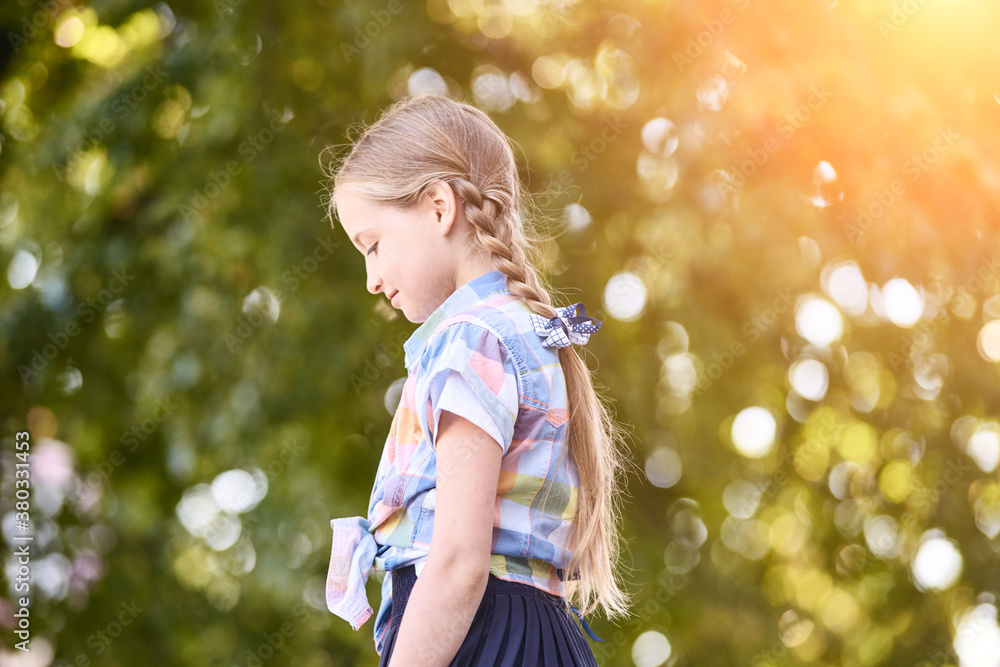 Beautiful american portrait of schoolgirl. Preschool kid. Little happy girl outdoors. Pretty female person. Adorable candid children. Summer park. Staycation. Profile look Beautiful american portrait of schoolgirl. Preschool kid. Little happy girl outdoors. Pretty female person. Adorable candid children. Summer park. Staycation. Profile look
