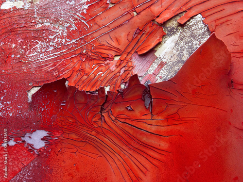 closeup macro of peeling decaying paint on an Amtrak train engine photo