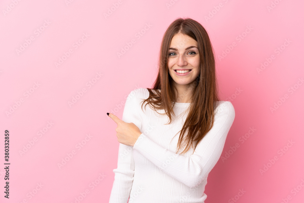 Young woman over isolated pink background Young woman over isolated pink background