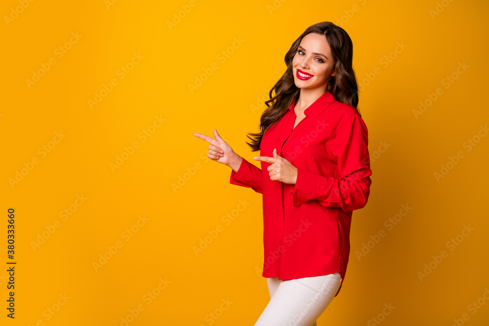 Photo of attractive pretty business lady hold hands directing fingers side empty space sales manager wear red office shirt white pants isolated yellow vibrant color background Photo of attractive pretty business lady hold hands directing fingers side empty space sales manager wear red office shirt white pants isolated yellow vibrant color background