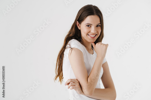 Pretty young smiling woman wearing casual clothes