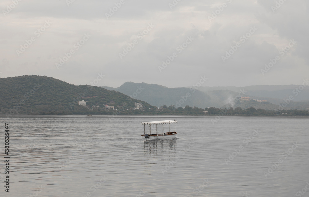 Tourist Boat on Lake in Udaipur. Rajasthan, India Tourist Boat on Lake in Udaipur. Rajasthan, India
