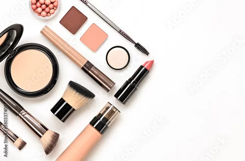 Obraz Beauty cosmetic makeup background. Fashion woman make up product, brushes, lipstick, nail polish layout. Creative pink concept. Cosmetology nude make-up accessories, top view.