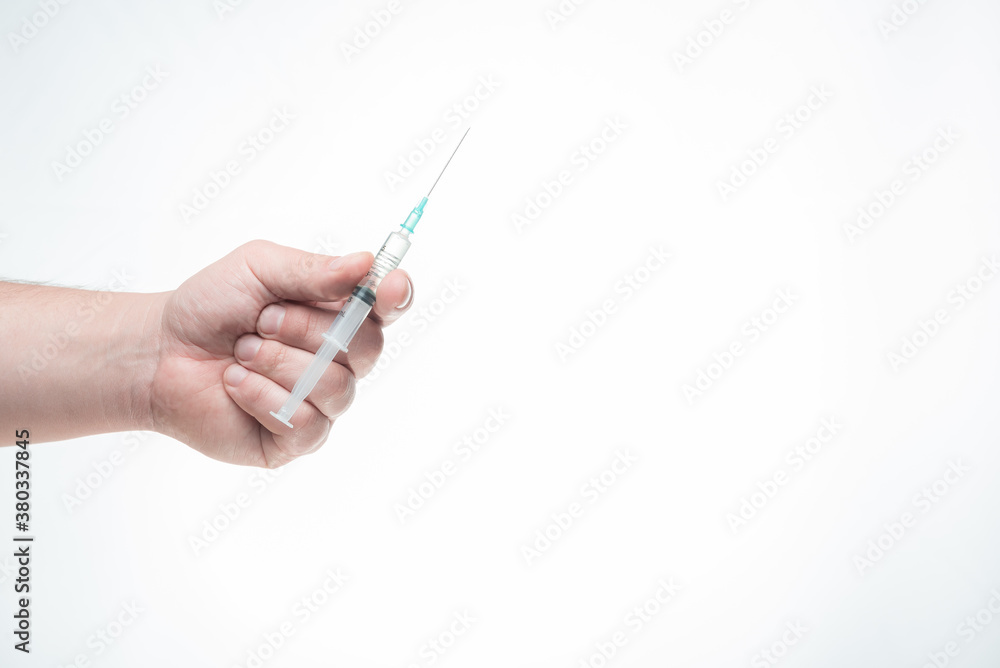 Hand applying covid-19 vaccine, corona virus antidote, white background (illustrative) Argentina Hand applying covid-19 vaccine, corona virus antidote, white background (illustrative) Argentina