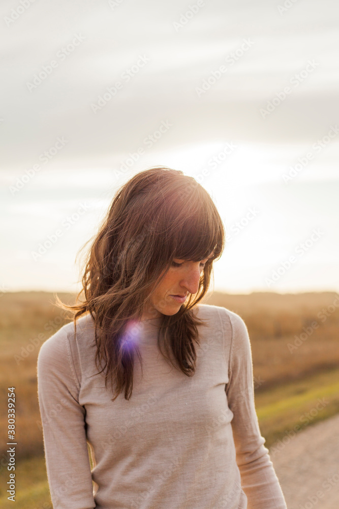 Portrait of woman on dirt road. Portrait of woman on dirt road.