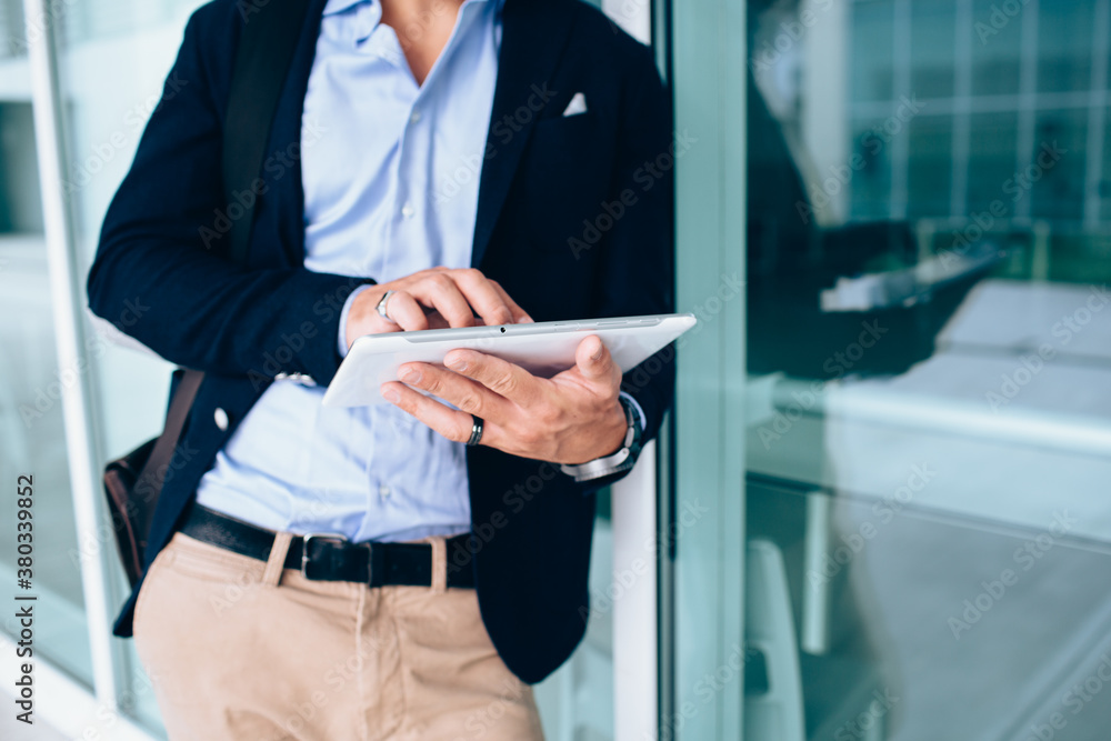 Young businessman using digital tablet Young businessman using digital tablet