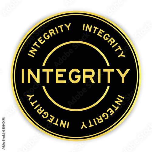 Black and gold color round sticker with word integrity on white background